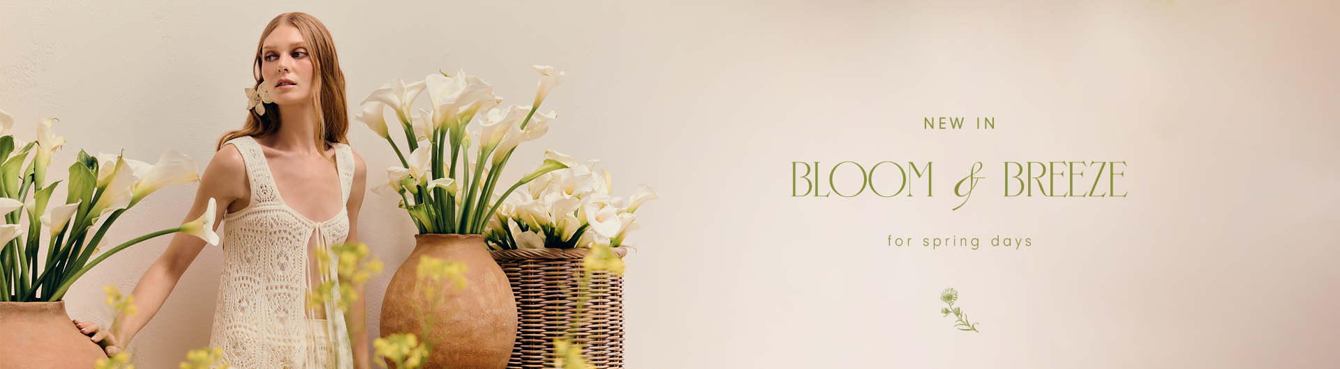 Wide Dress To Bloom and Breeze new in for spring days collection banner featuring a model in a white crochet dress with calla lilies on a beige background