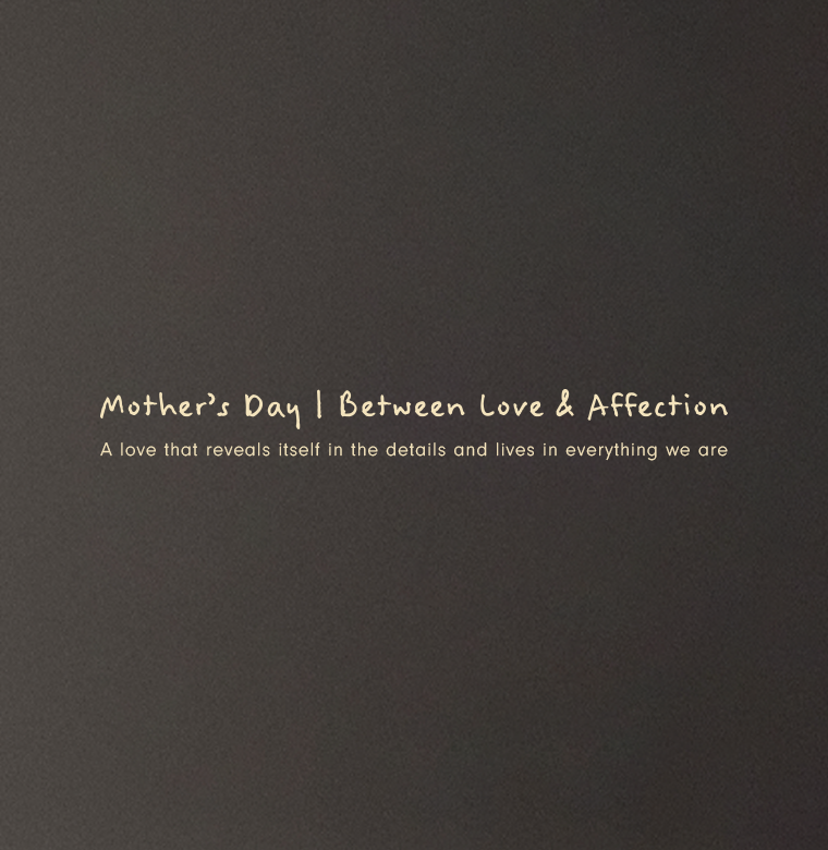 Dark gray Mother's Day campaign banner with handwritten text reading "Mother's Day | Between Love & Affection — A love that reveals itself in the details and lives in everything we are".