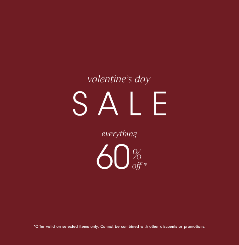 A square promotional graphic with a deep red background. Centered white text reads 'valentine’s day SALE' in a sleek serif font, with 'everything 60% off' displayed below it. A small disclaimer at the bottom states 'Offer valid on selected items only.